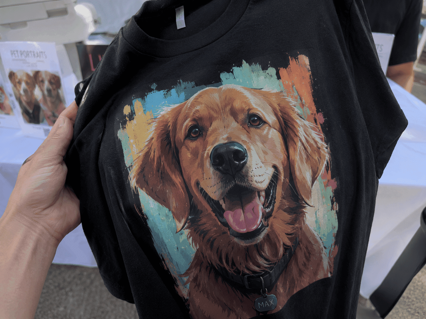 Close-up of a printed shirt featuring an AI golden retriever pet portrait
